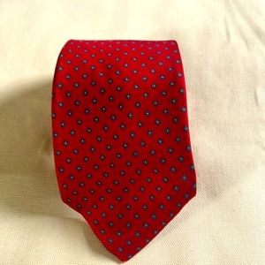 Pietro do Como silk necktie. Red with blue design